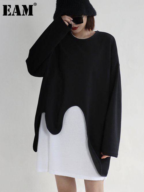 Zdjęcie Luźna Czarna Bluza Damska – Modna i Komfortowa