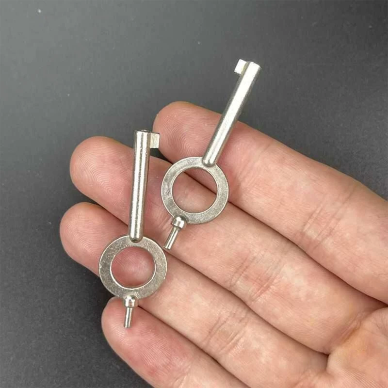 Imagen de Llaves de Esposas Americanas Edición Estándar - Juego de 2 Unidades, Alta Precisión y Resistencia al Desgaste para Aplicaciones de Ley y Orden