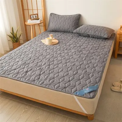 Image de Surmatelas Imperméable Matelassé - Protection Hivernale pour Lit Simple ou Double