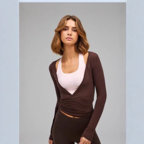 Immagine di Top Donna Yoga Wrap con Nodo Frontale, Maniche Lunghe Slim Fit, Modello Crop Top Y2K in Tessuto Solido per Allenamento, Balletto e Stile Coquette Sweet Chic