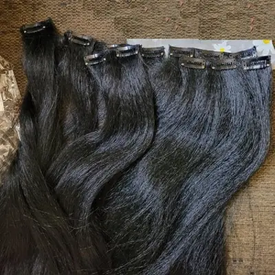 Image de Extensions cheveux humains lisses & bouclés à clipser 100g