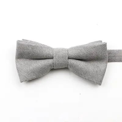 Image de Noeud Papillon Uni en Daim - Élégant & Doux pour Adultes et Enfants