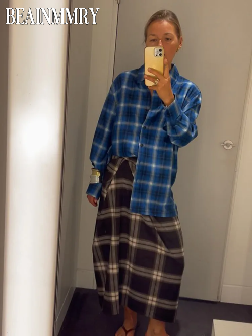 Image of Women's High-Waisted Checked Midi Skirt with Pleated Irregular Hem – Fashionable Casual Slim Fit for Daily Wear and Commute