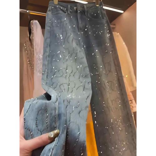 Immagine di Jeans con diamanti con stampa a caldo per donna 2025 Pantaloni a gamba larga con rivetti lucidi alla moda primavera autunno Pantaloni in denim larghi dritti femminili