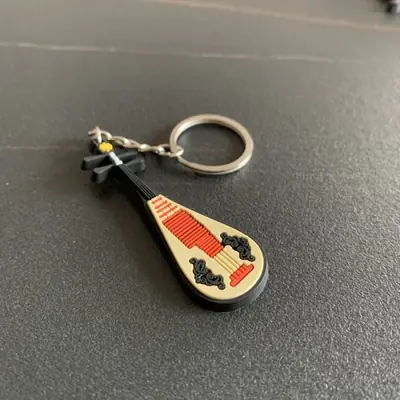 Image de Guitare en Silicone - Porte-clés Musical Mignon