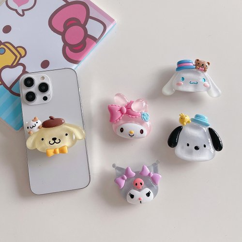 Immagine di Supporto per Telefono Cellulare 3D Sanrio Luminoso con Kuromi, My Melody e Pochacco – Impugnatura Creativa e Decorativa per Smartphone