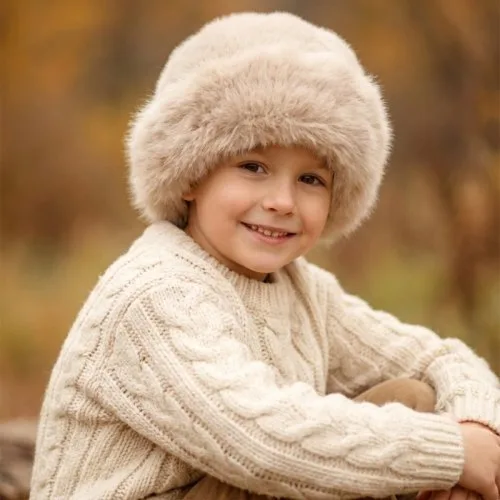 Niño beige