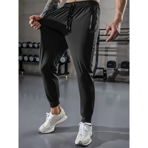 Imagen de Pantalones Deportivos Hombre Transpirables y Elásticos de Seda Helada para Correr, Fútbol, Gimnasio y Pesca - Cómodos y Holgados