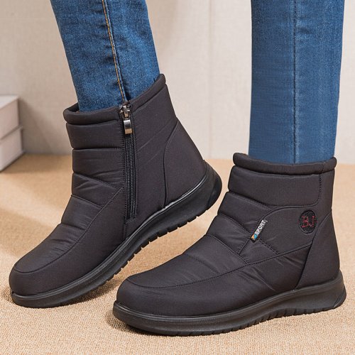 Afbeelding van Warmte en Stijl in de Winter: Waterdichte Dameslaarzen met Bontvoering, Lage Hakken en Platte Zool voor Comfortabele Sneeuwbootjes