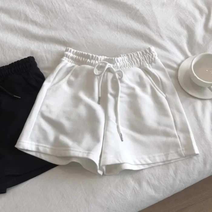 Immagine di 2025 Pantaloncini estivi Donna Elasticità Belle ragazze Stile coreano Studenti dolci Harajuku Pantaloni semplici grigi puri Donna