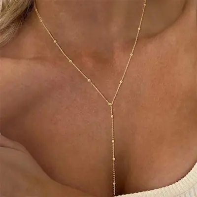 Image de Collier Long Vintage Or avec Pompon - Style Élégant