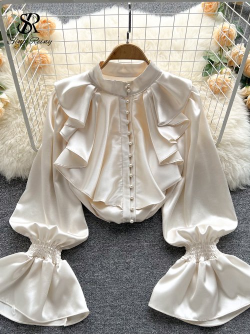 Image of Elegant Satin Loose Blouse with Long Flared Sleeves, Ruffles, O-Neck and Beaded Detailing for Women – Perfect for Office or Casual Wear