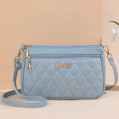 Image de Sac à Main Brodé en Cuir - Élégant & Pratique