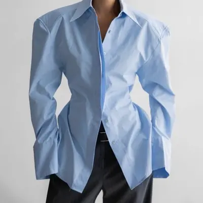 Image de Chemise Blanche Manches Bouffantes - Élégante & Chic