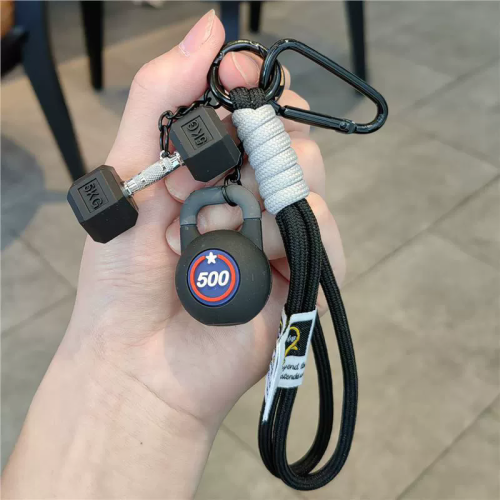 Zdjęcie Brelok fitness w kształcie sztangi – idealny prezent dla miłośników siłowni i sportu, ozdoba do kluczy, plecaka lub torby