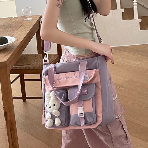 Bild von Praktische Schul- und Nachhilfetasche für Mädchen und Jungen – Große Umhängetasche mit viel Stauraum für Bücher, Hefte und Laptop