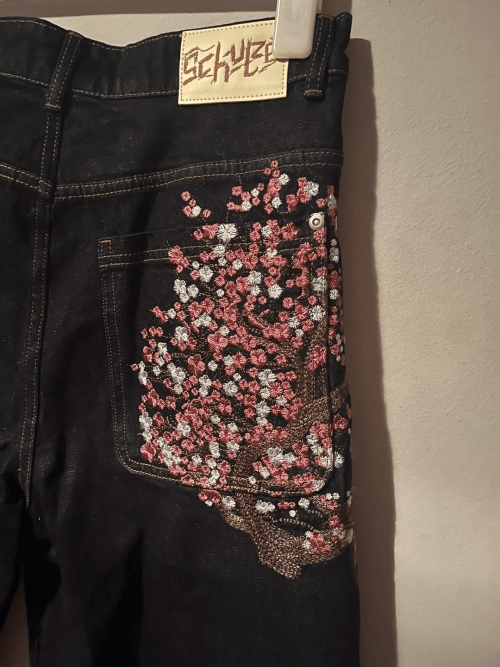 Image of Unisex Black Slim Straight Leg Jeans with Cherry Blossom Print and Embroidered Back Pockets – Comfort Stretch Casual Pants for Everyday Wear