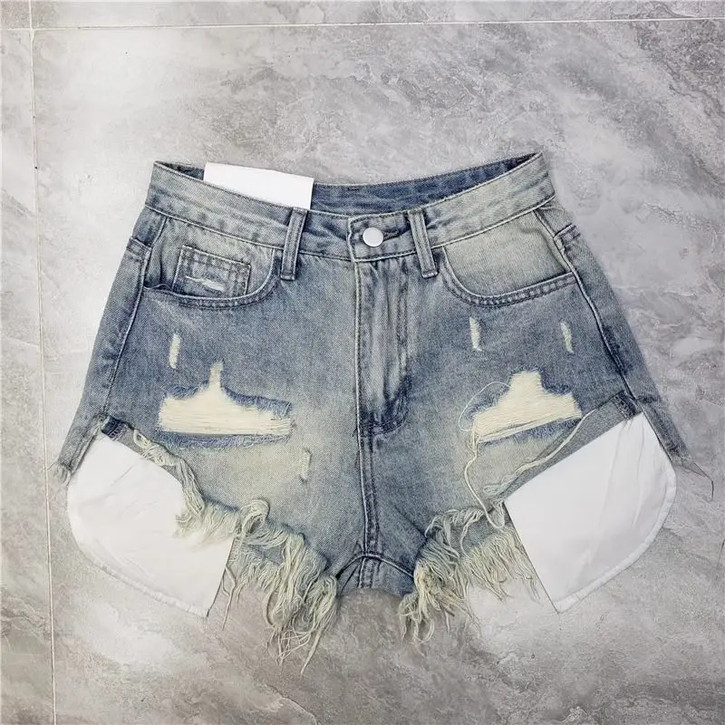Immagine di 2026 Pantaloncini di jeans strappati con nappa nuova estate 2026 Pantaloncini y2k a forma di A a vita alta da donna Rosa Blu