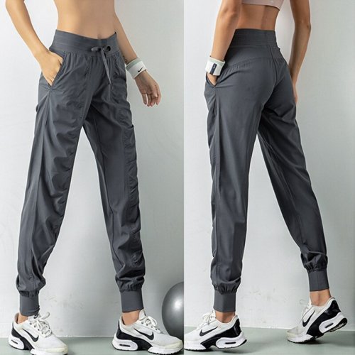 Afbeelding van Comfortabele en snel drogende joggers voor dames met trekkoord, perfect voor hardlopen, gym en fitness