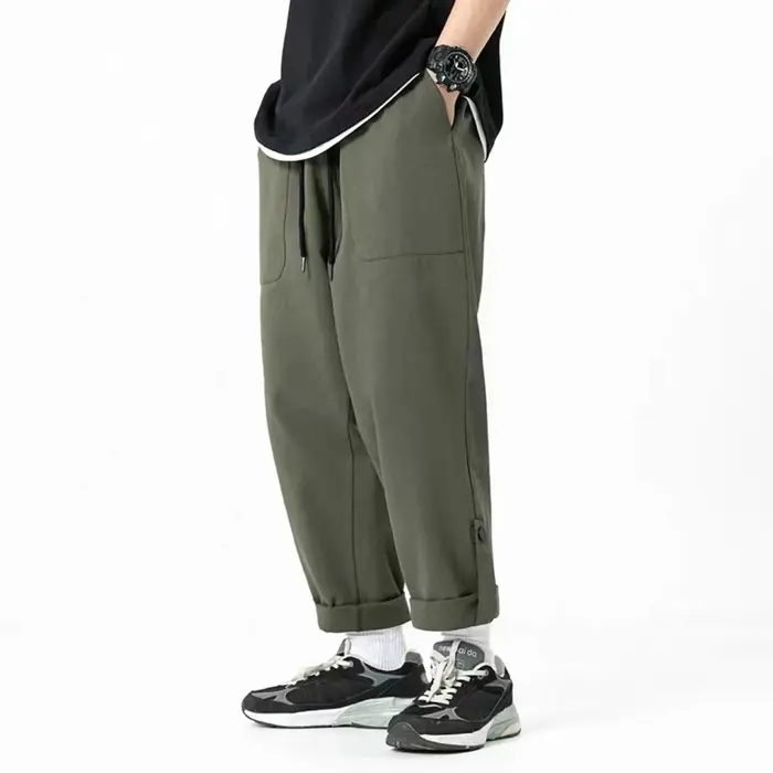 A7 verde pantaloni