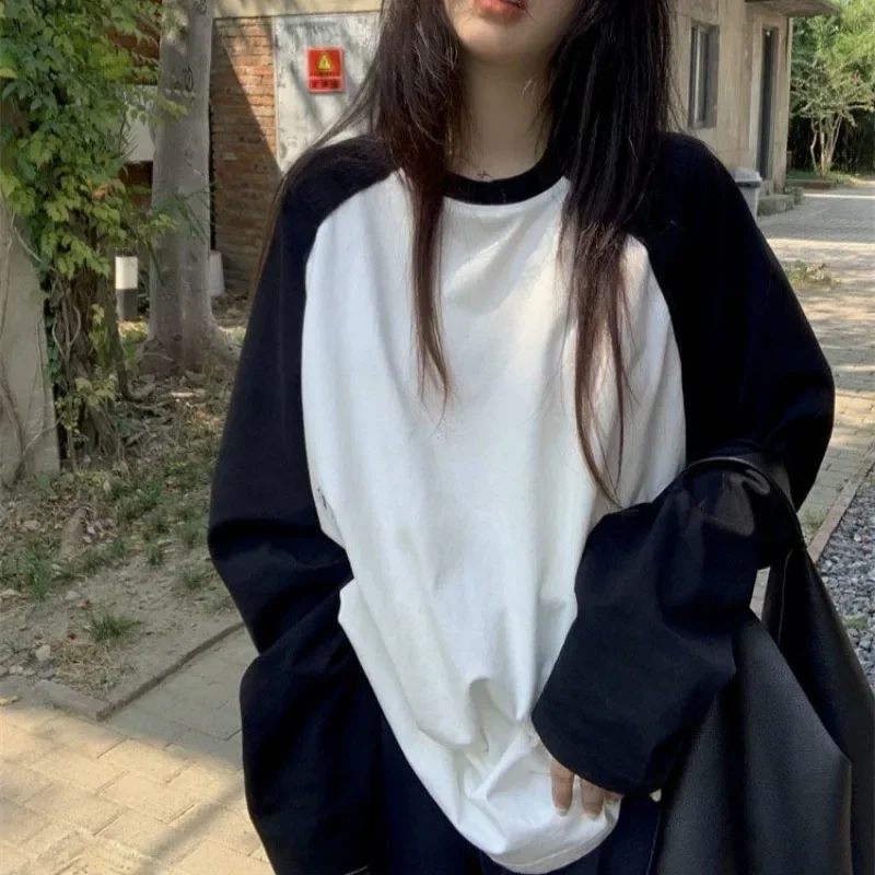 Image of Stylish Oversized Y2K Patchwork T-Shirt for Women – Harajuku-Inspired Long Sleeve O-Neck Top in Black and White, Perfect for Spring and Autumn Streetwear Fashion