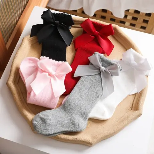 Image de Chaussettes Hautes Bébé avec Gros Nœud - Coton Doux